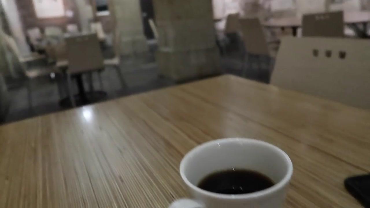 Cup of coffee inside the Café in the Crypt beneath St Martin-in-the-Fields