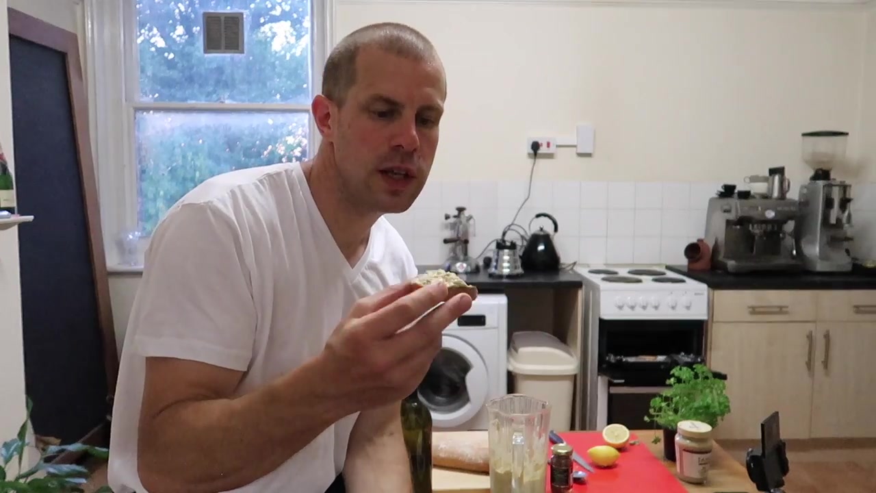 Barry Roberts tasting the finished anchovy and chickpea crostini