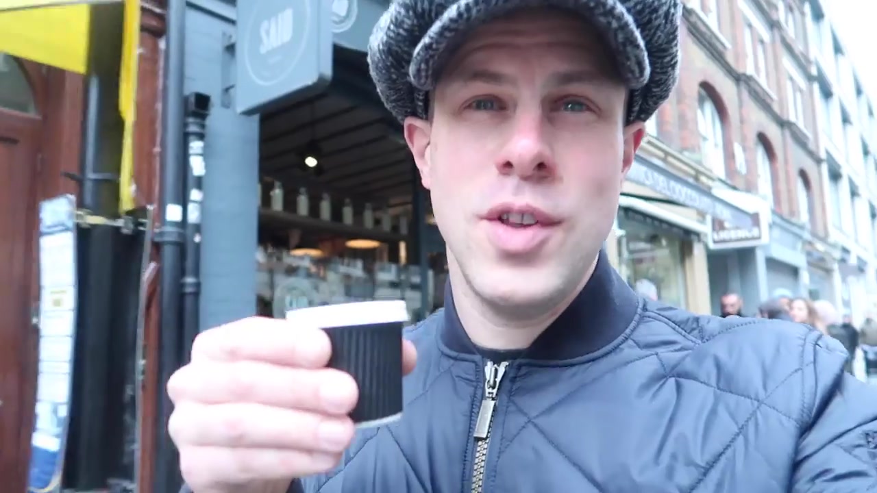 Barry Roberts tasting hot chocolate outside SAID dal 1923 in Soho