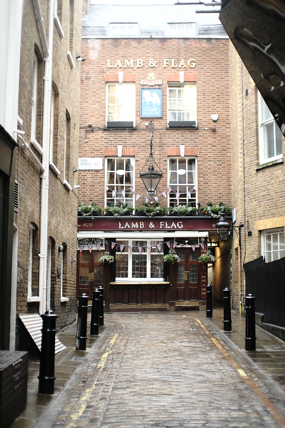 The Lamb & Flag pub at the end of its narrow Rose Street approach in Covent Garden