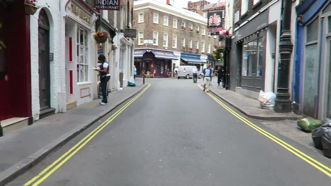 Narrow entrance lane leading into Shepherd Market in Mayfair