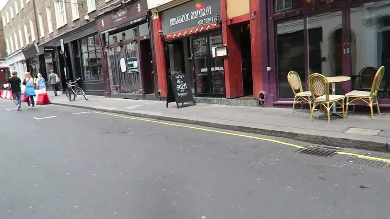 Restaurant frontages and pavement tables in Shepherd Market Mayfair