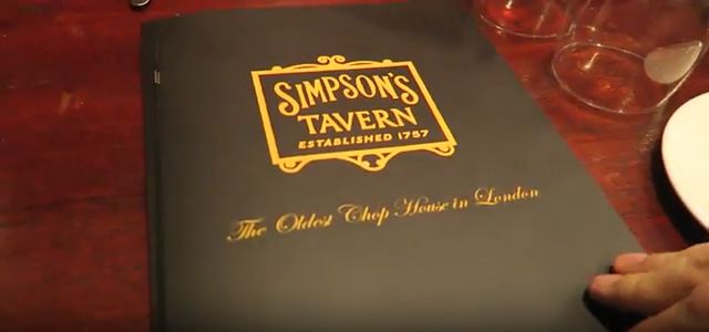 Black Simpson’s Tavern menu displaying the gold Established 1757 crest