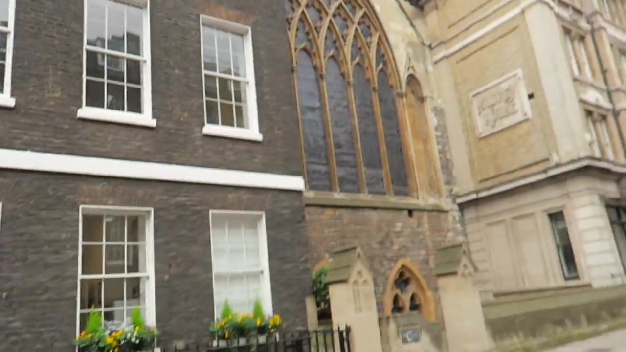 St Etheldreda's Church beside the Georgian houses of Ely Place in London