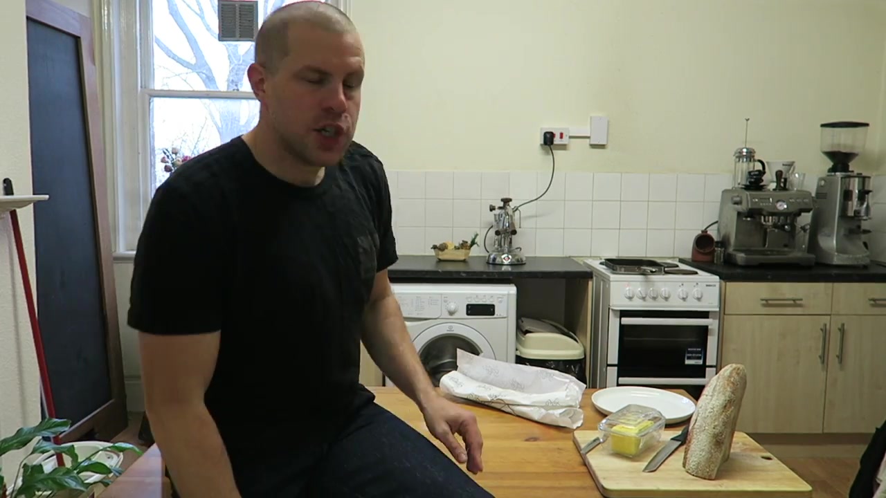 Barry Roberts introducing a double bacon sandwich recipe in his London kitchen