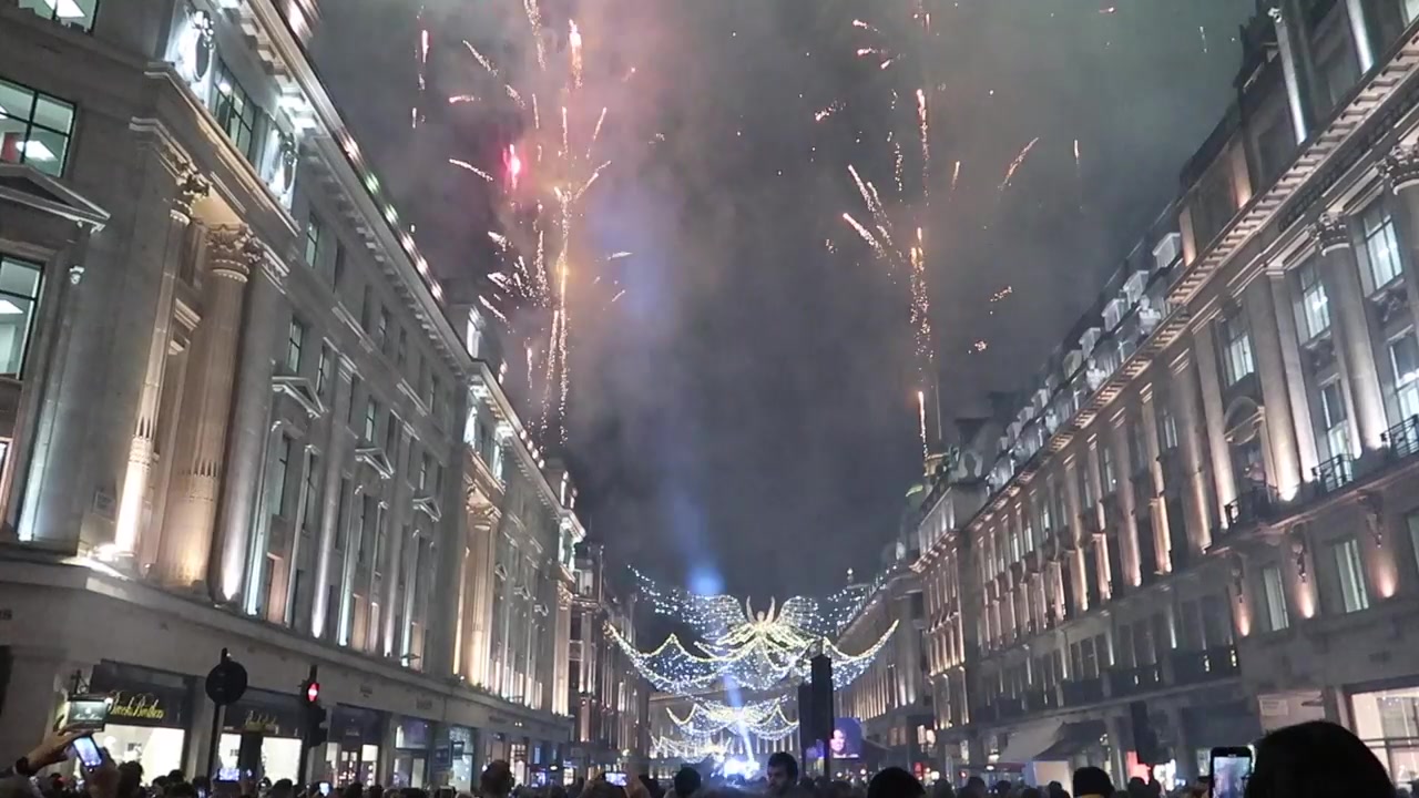 Fireworks above Regent Street’s Christmas lights in the opening montage.