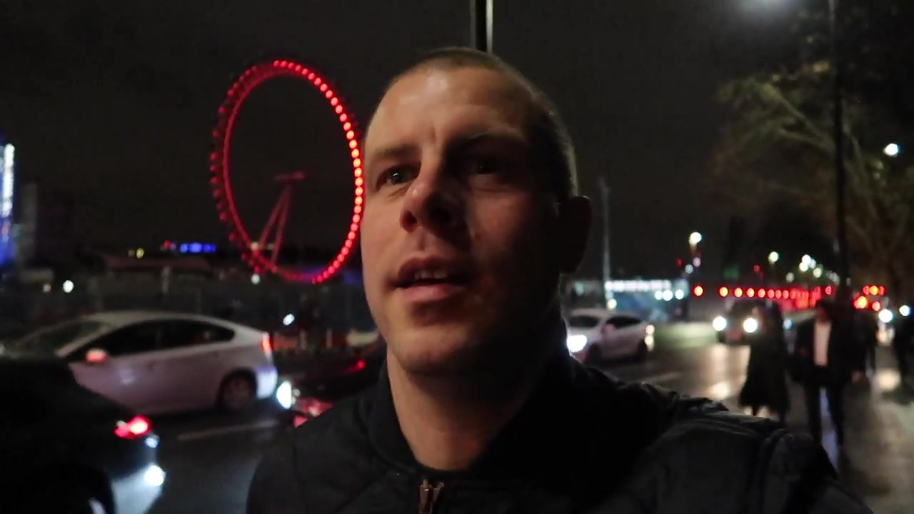 Barry Roberts beginning the December episode beside the London Eye.