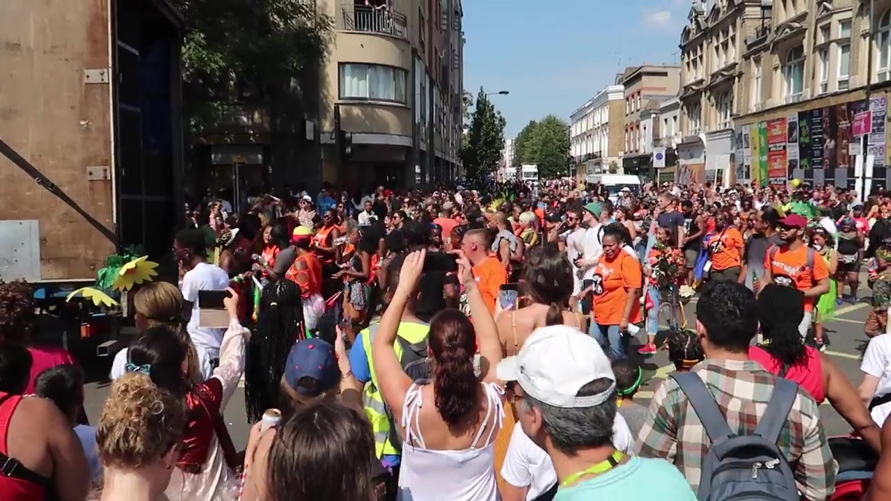 Large crowds watching Notting Hill Carnival in London
