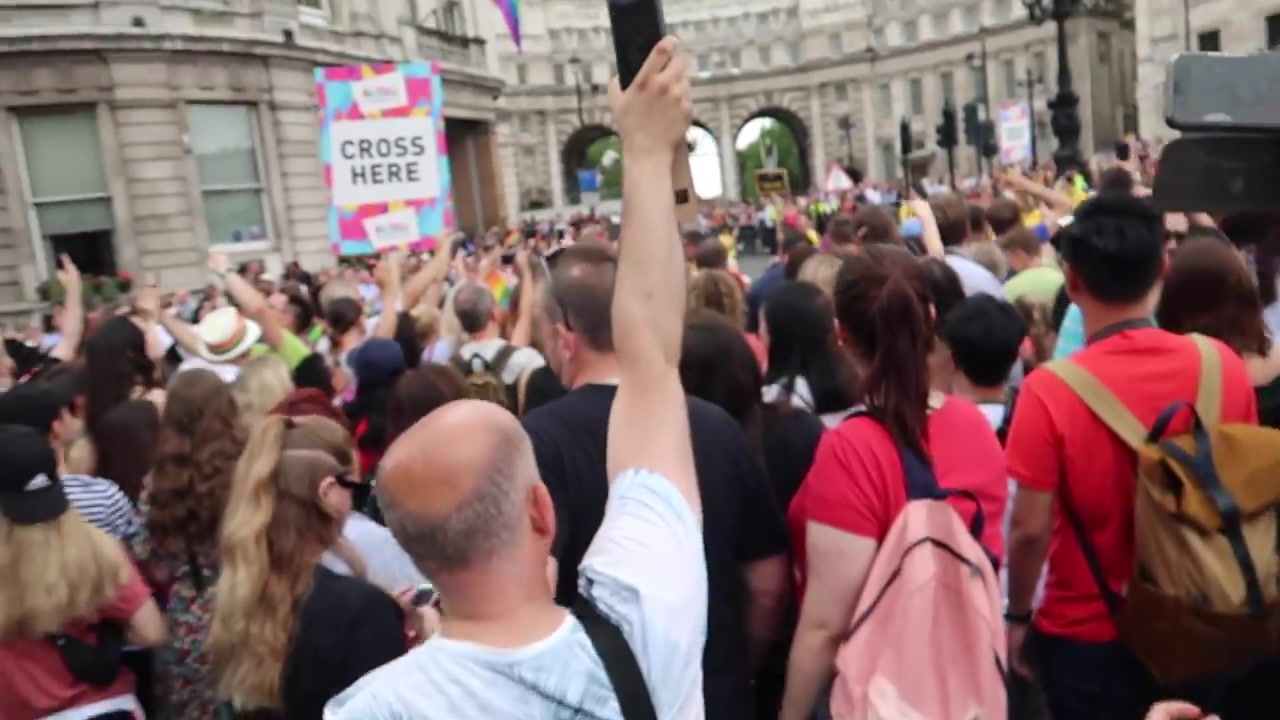 Spectators watching the Pride parade in central London.