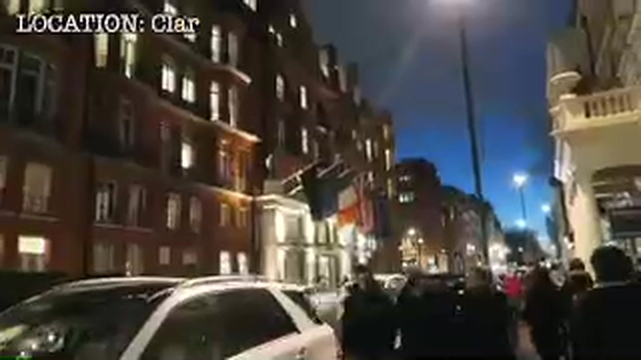 Illuminated entrance of Claridge’s hotel in Mayfair during a February 2017 night walk