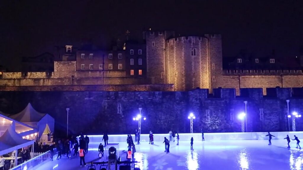 The Tower of London rising above its seasonal ice rink in 2018.