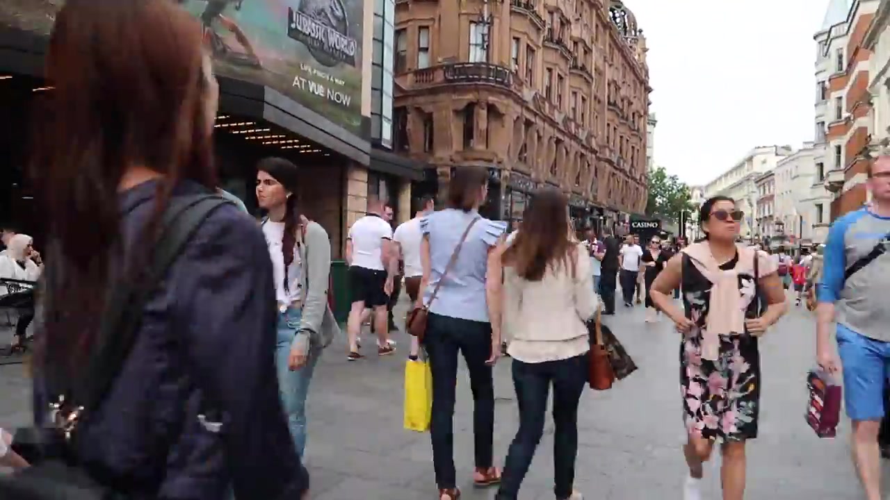 Visitors walking near the Hippodrome in the London West End during summer 2018