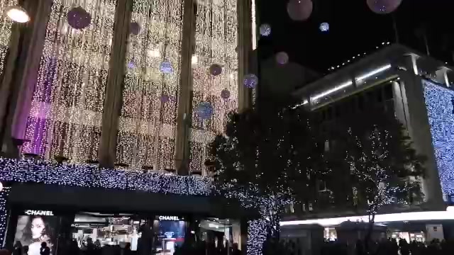 Christmas lights decorating an Oxford Street department store.
