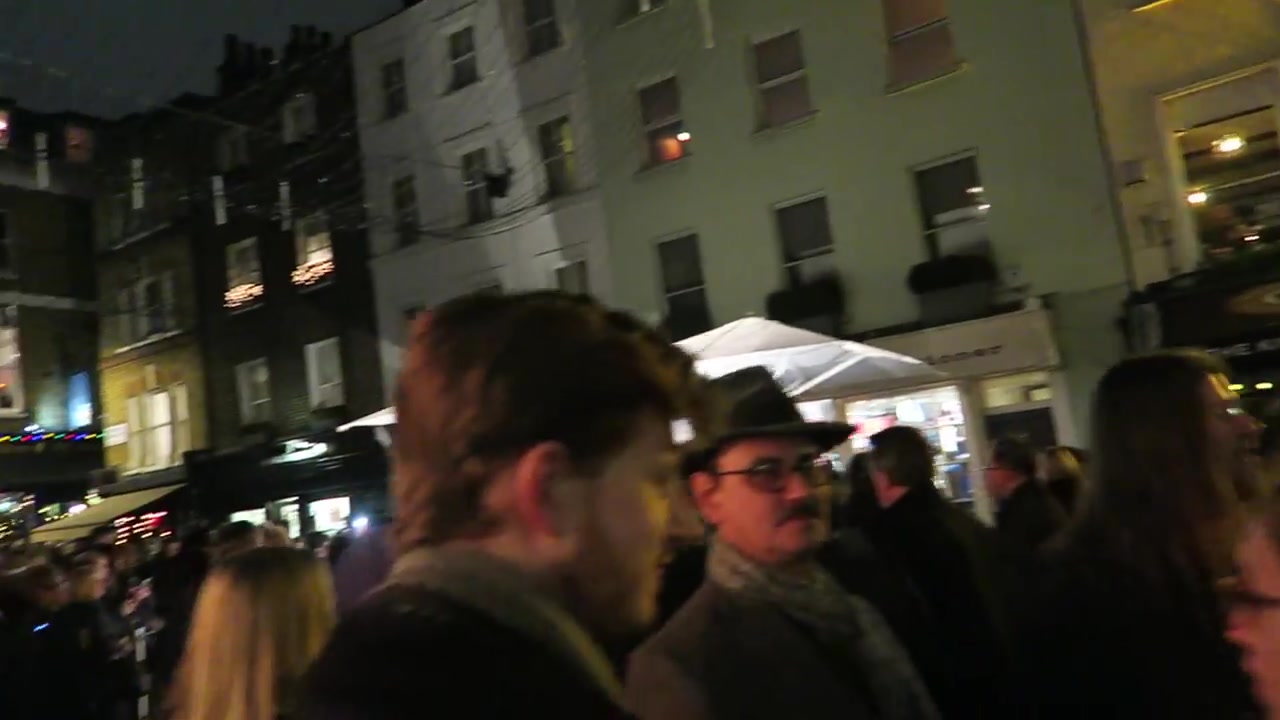 White Christmas lights suspended above Shepherd Market in Mayfair