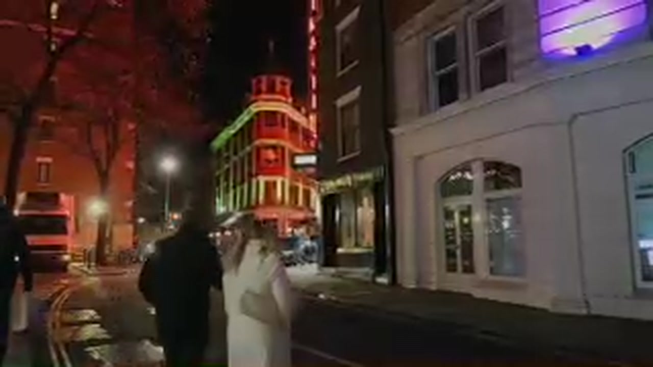 Red frontage of J Sheekey restaurant near Leicester Square at night in February 2017