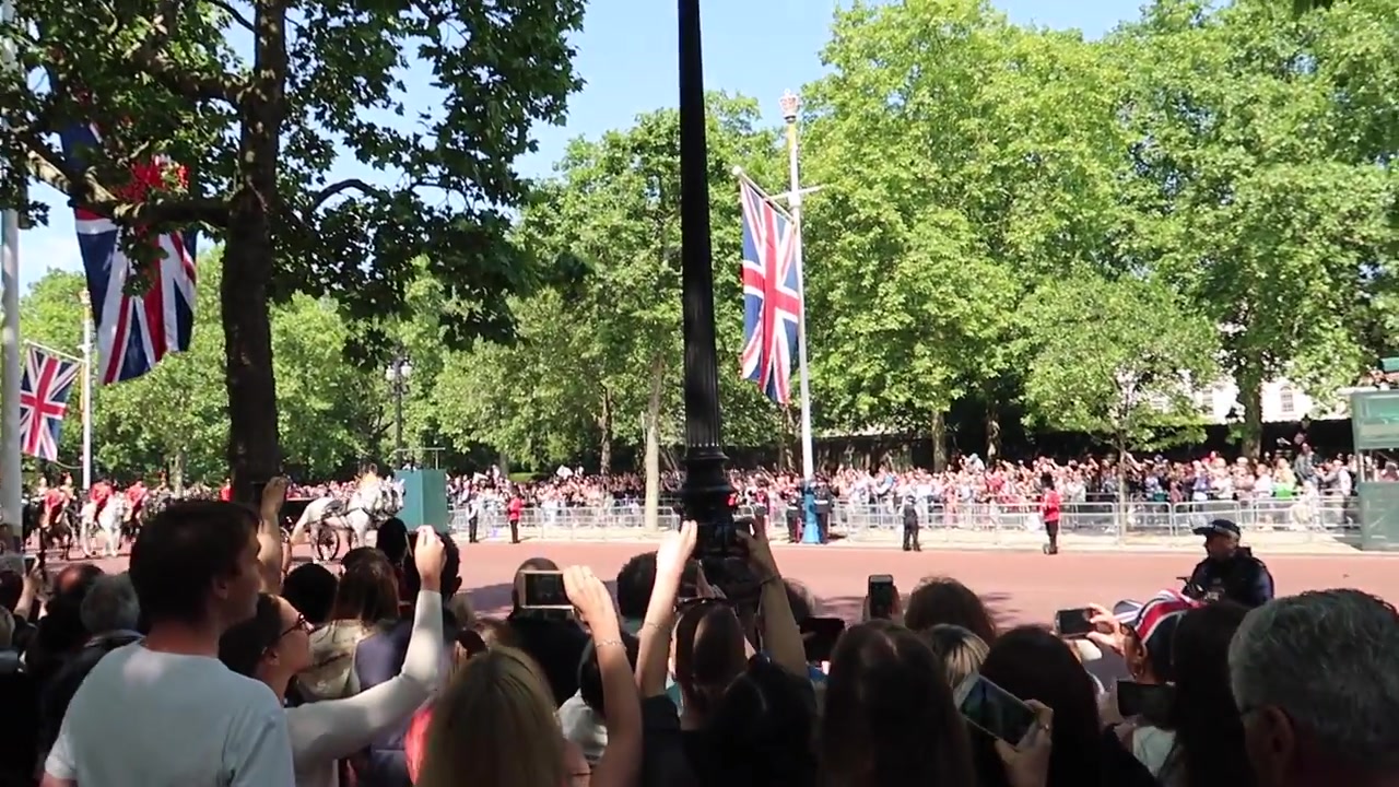 Trooping the Colour procession passing spectators beside St James’s Park in London