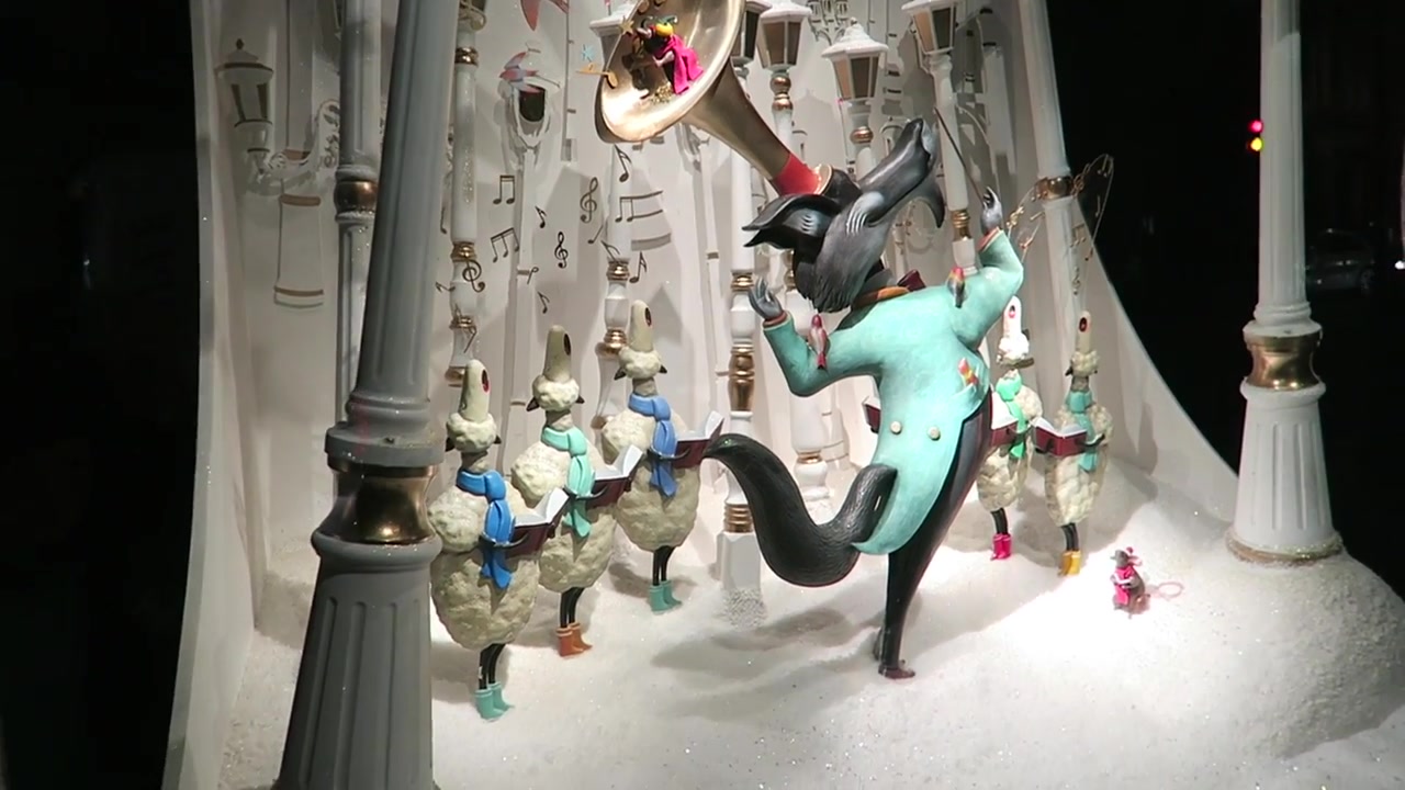Whimsical cat and mice figures in a Fortnum & Mason Christmas window in 2016