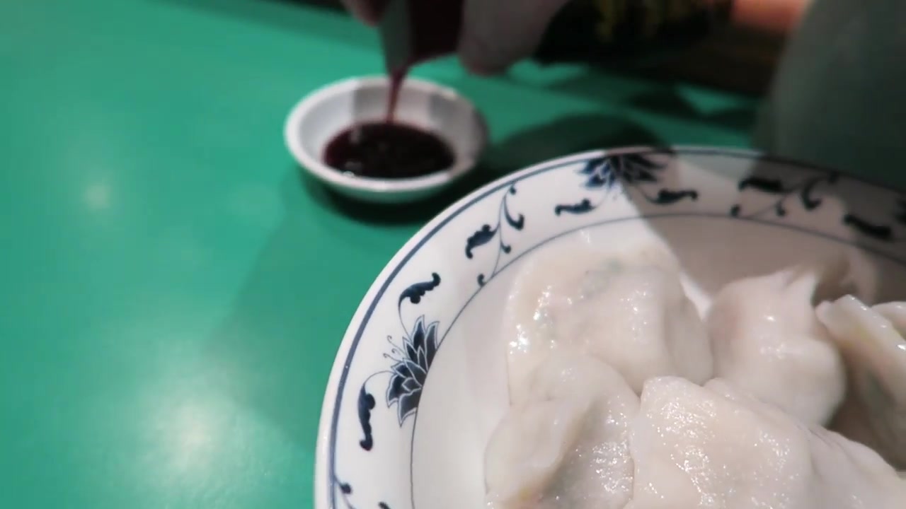 Plate of boiled Beijing-style dumplings served at Jen Café in Chinatown