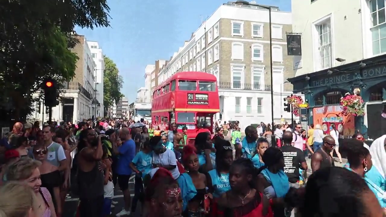 Crowd gathered near a sound system at Notting Hill Carnival