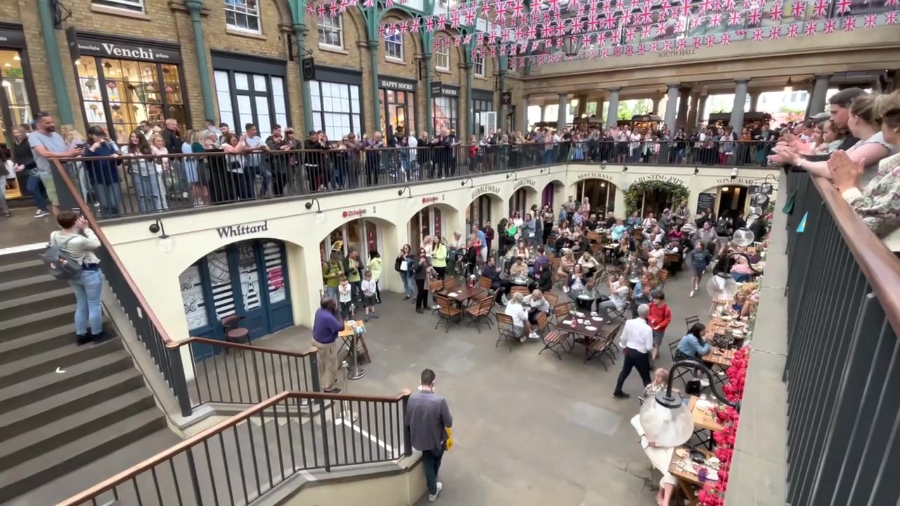 Visitors inside the Covent Garden Market Building in 2022