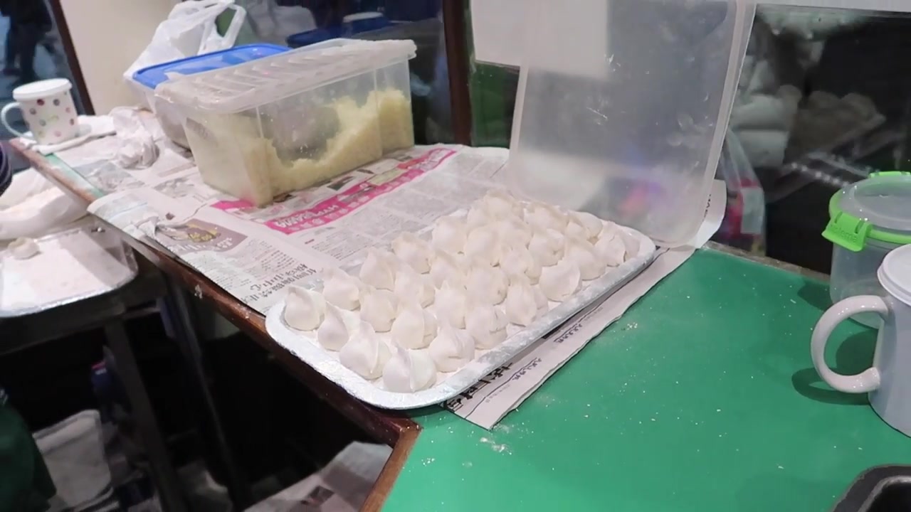 Tray of freshly prepared dumplings at Jen Cafe