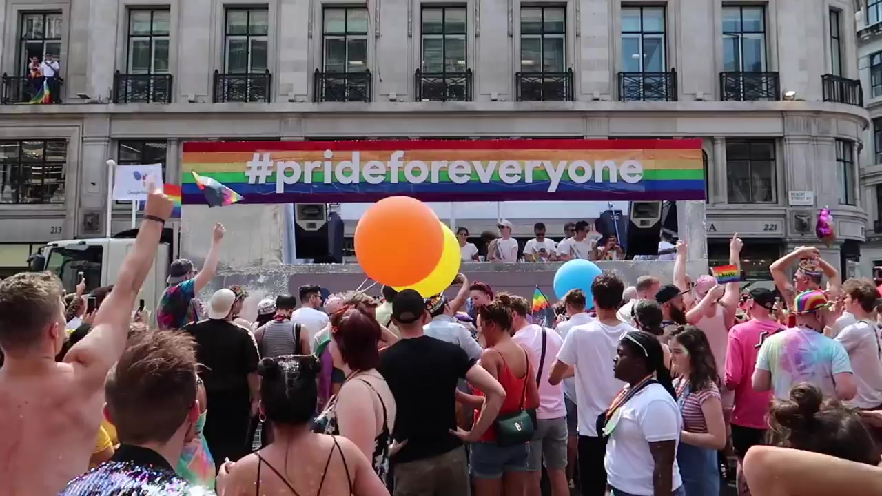 Pride for Everyone bus surrounded by crowds during Pride in London 2018