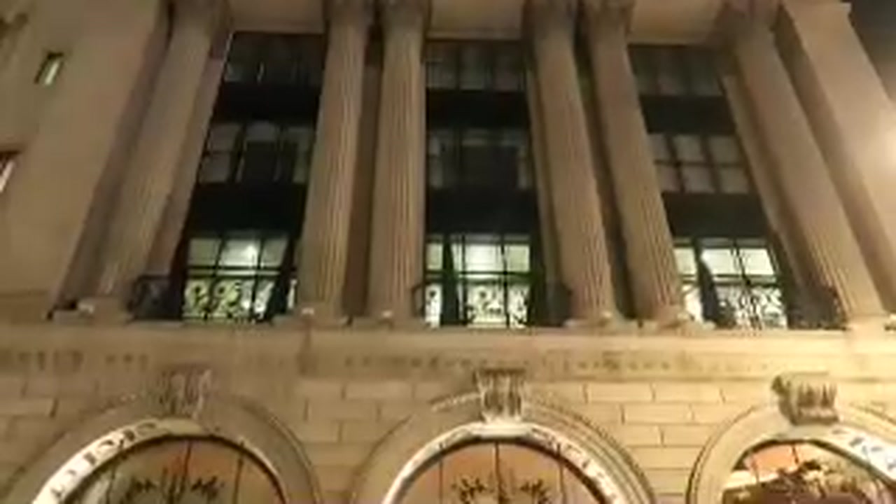 Illuminated Ritz London entrance on Piccadilly during a February 2017 evening walk