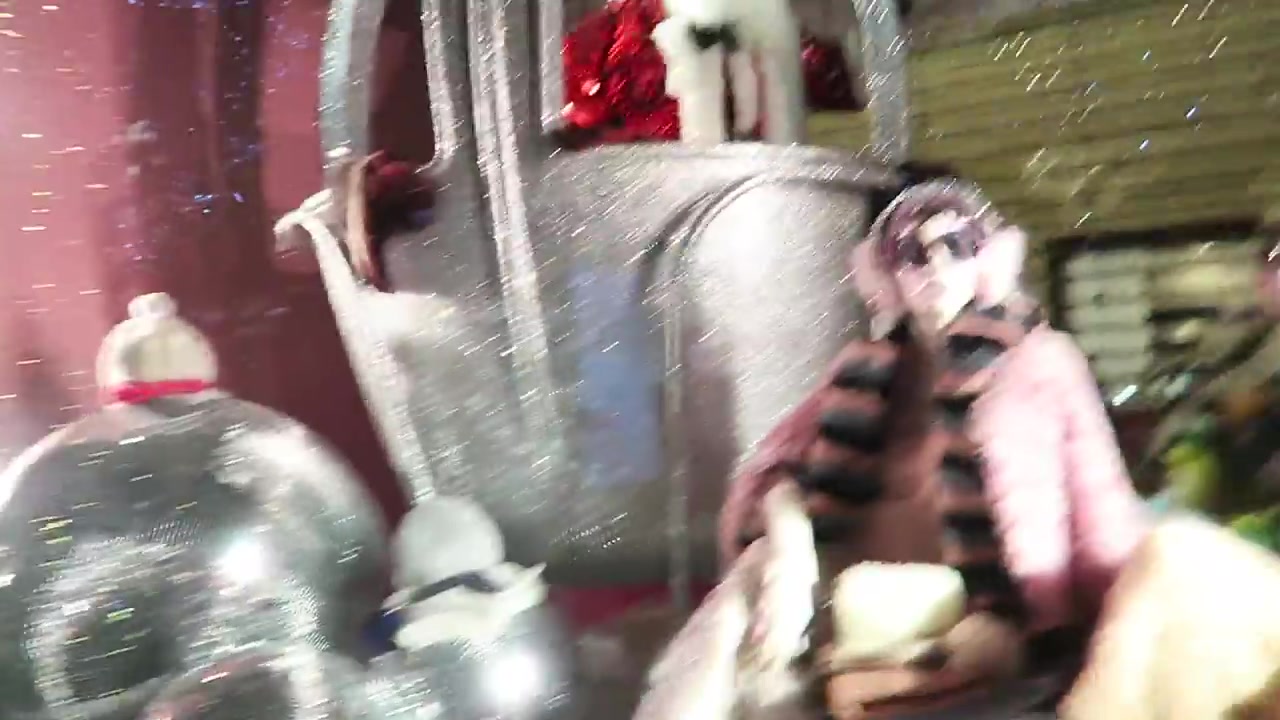 Santa travelling with poodles in a Selfridges Christmas window display in 2016