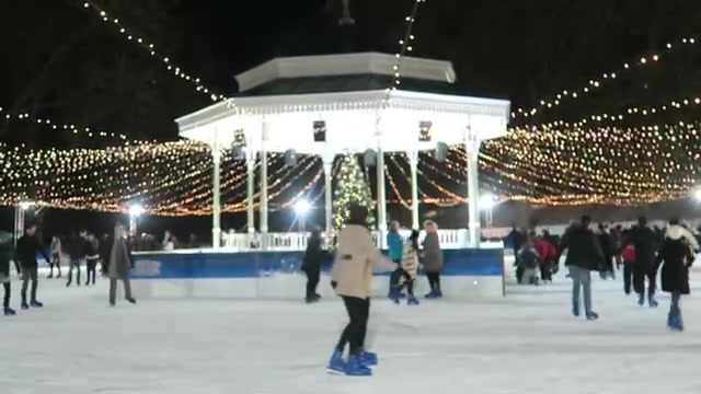 Skaters circling the bandstand ice rink at Hyde Park Winter Wonderland 2016