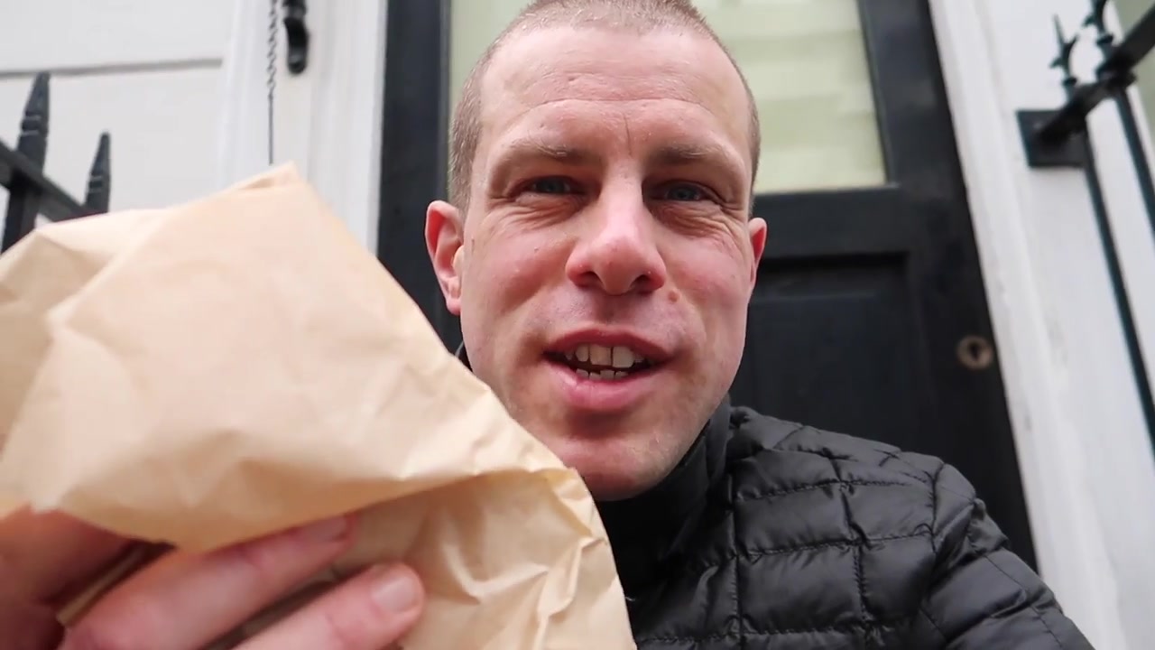 Tasting a freshly made sausage sandwich in Marylebone