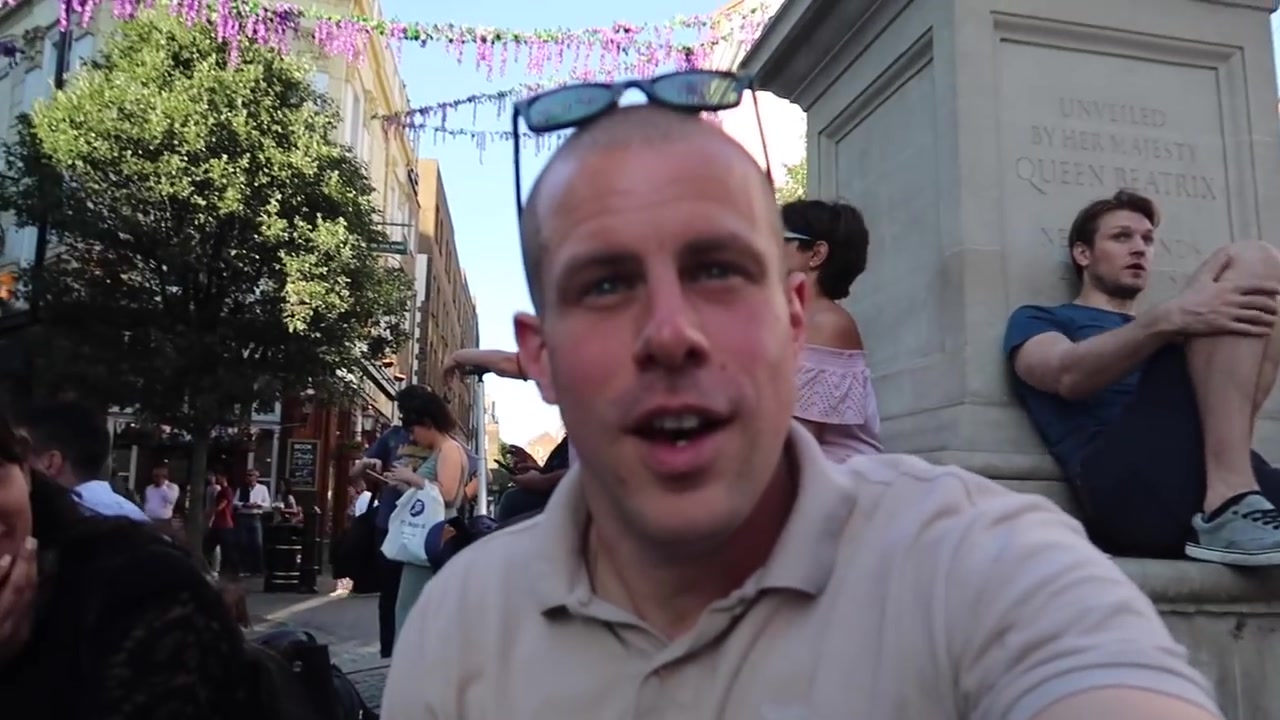 Barry Roberts seated outside Homeslice in Neal's Yard during summer 2018