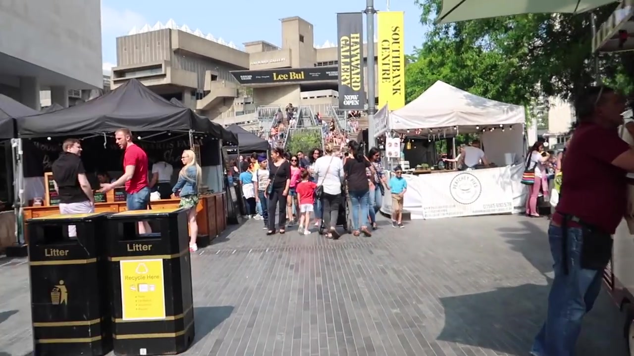 Crowds browsing food stalls at Southbank Centre Food Market in summer 2018