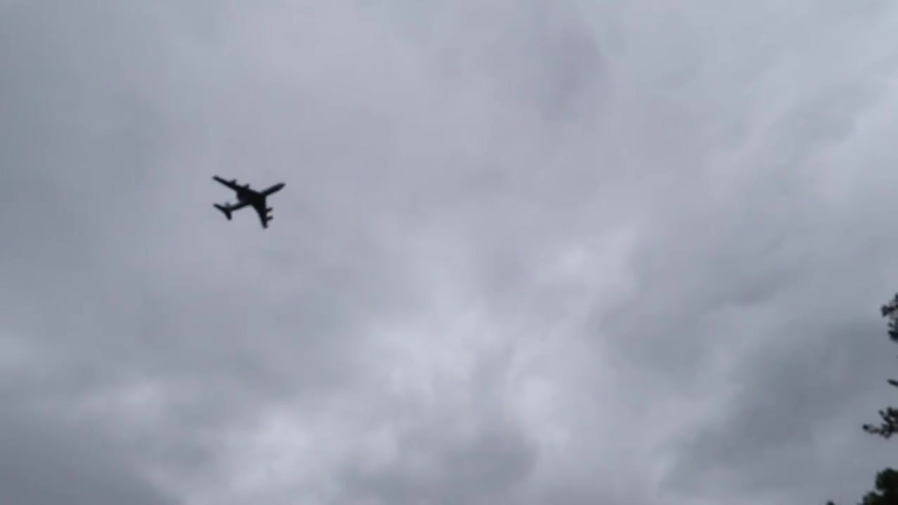 RAF transport aircraft flying over Green Park during the centenary flypast