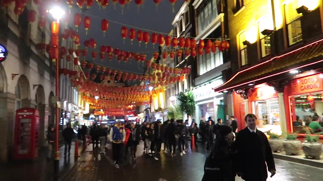 Rows of red lanterns stretching above Chinatown.