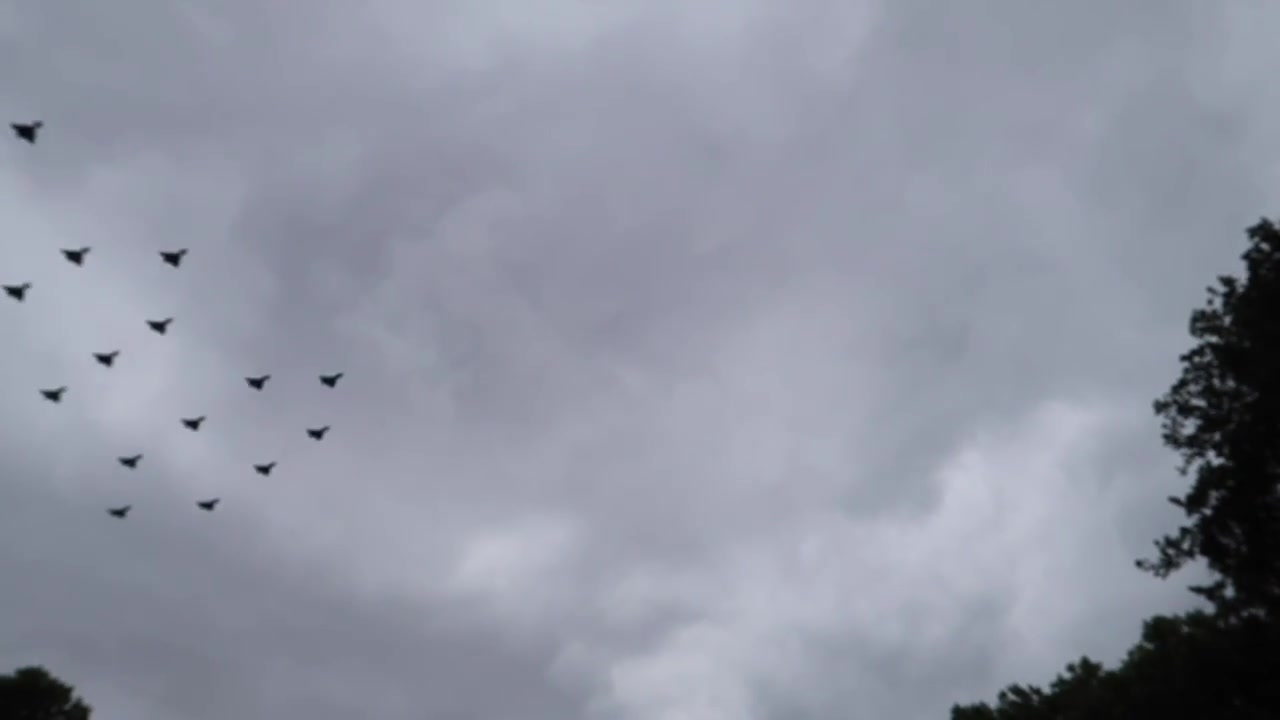 Large formation of RAF aircraft crossing the sky over central London