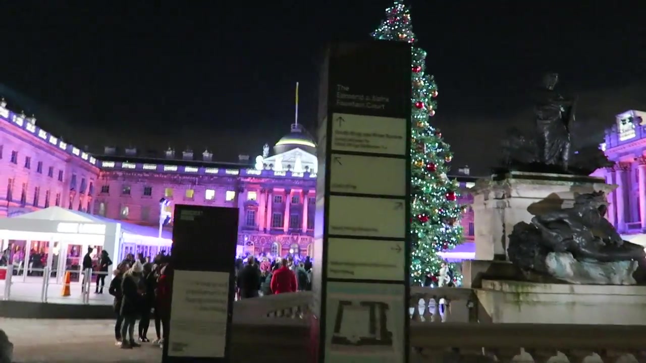 Skaters on the illuminated courtyard ice rink at Somerset House in December 2016