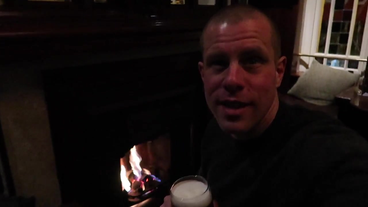 Barry Roberts warming up beside the pub fire after visiting London’s Christmas markets.