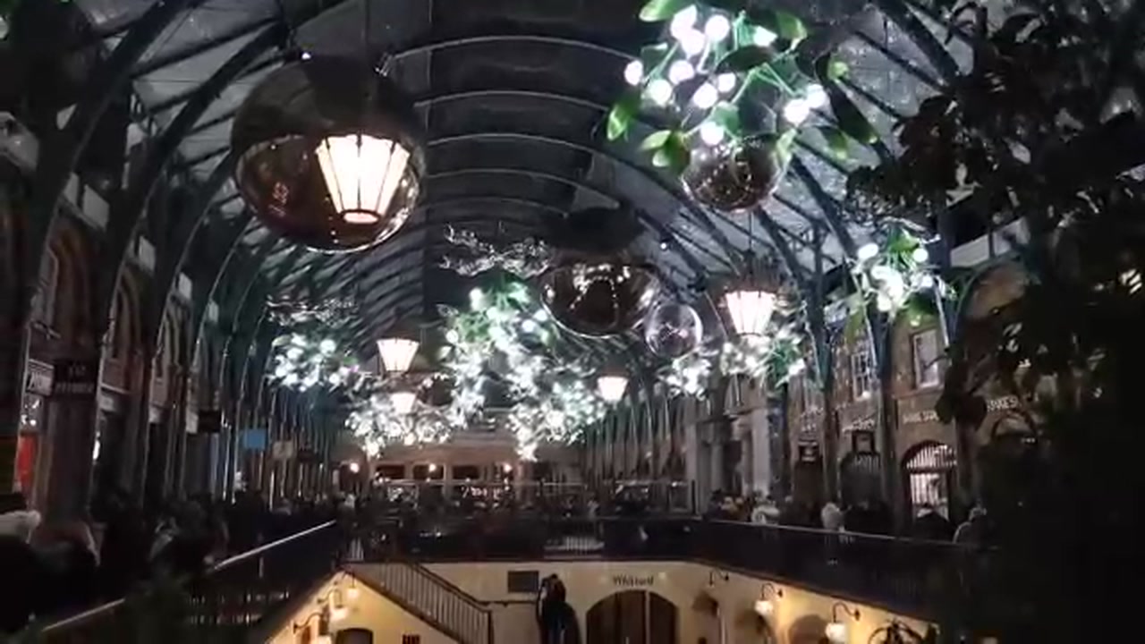 Festive Christmas decorations inside Covent Garden Market