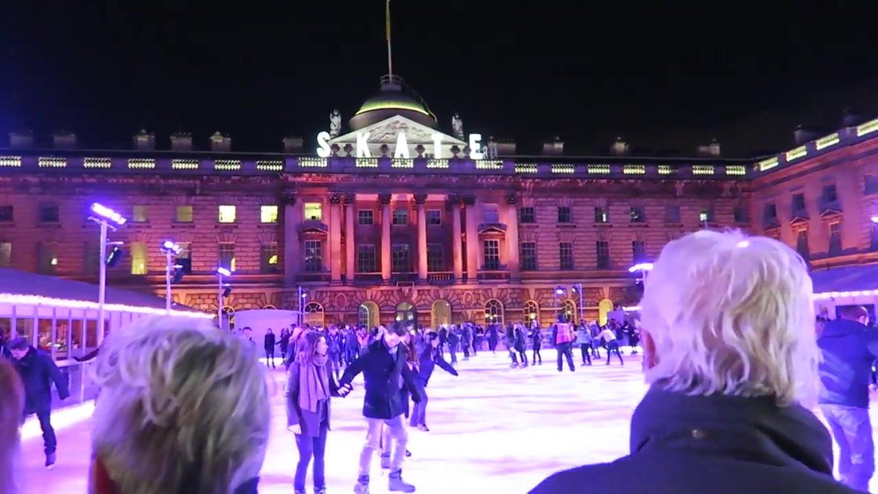 Large decorated Christmas tree in the illuminated courtyard at Somerset House in 2016