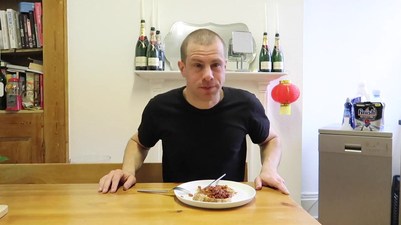 Barry Roberts tasting homemade smoky baked beans on toast