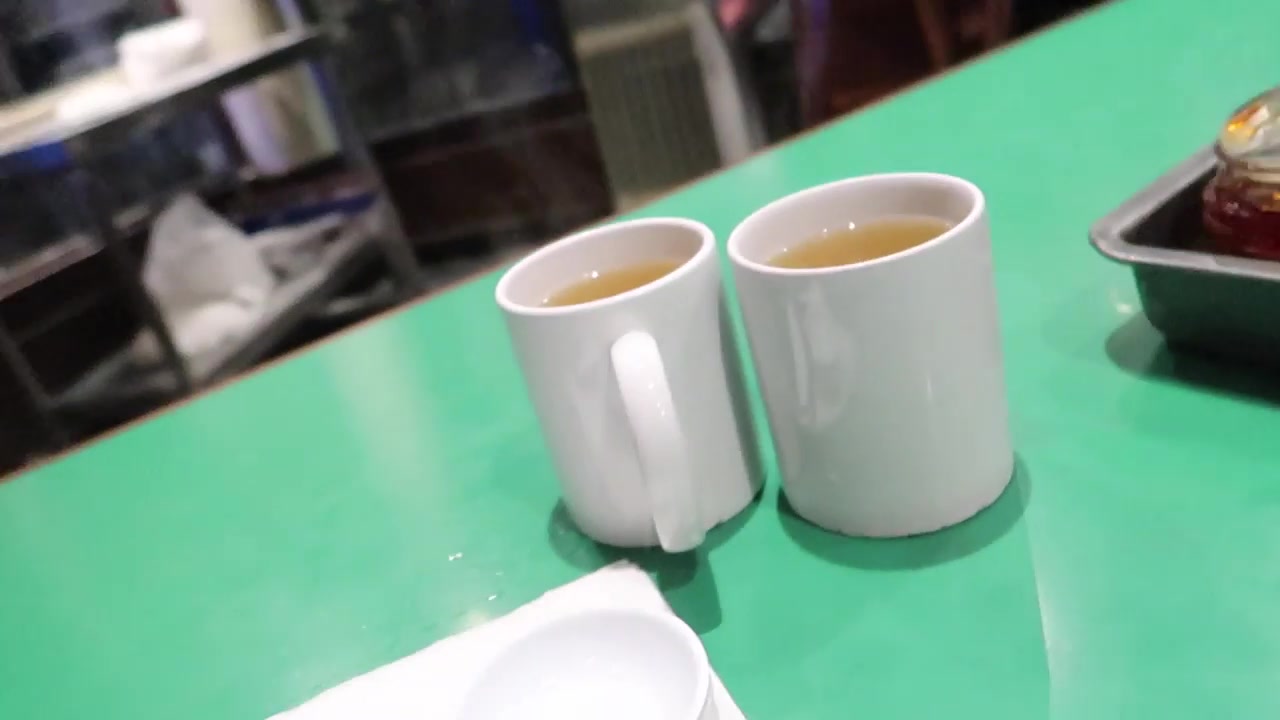 Green tea and dumplings served at Jen Cafe in London Chinatown