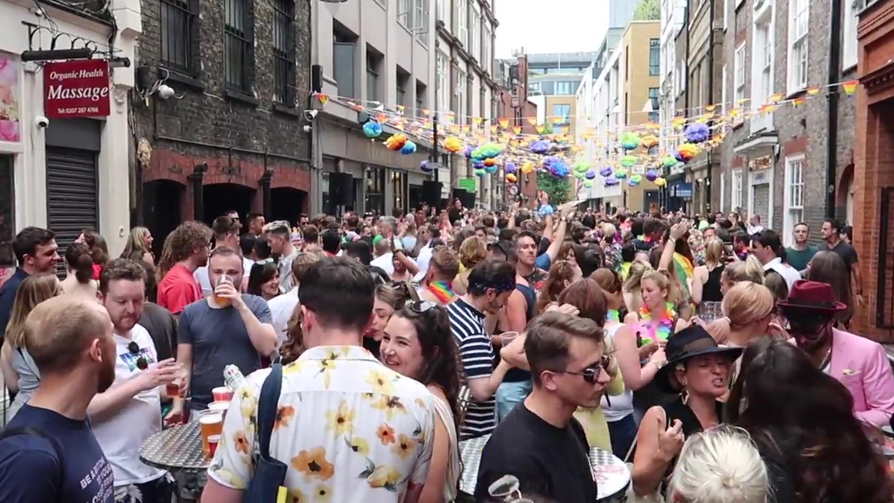 People gathering in Soho for the Pride street celebrations.