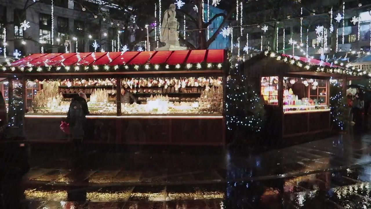 An illuminated stall at Leicester Square’s Christmas market.