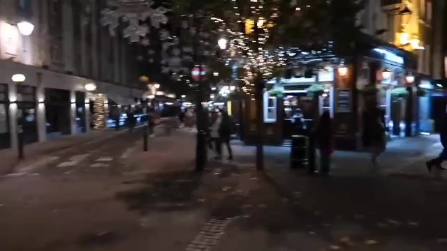 The evening walk through Seven Dials before its lights were switched on.