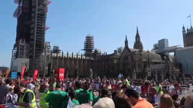 Marathon crowds in Westminster beneath the scaffolding around Big Ben.