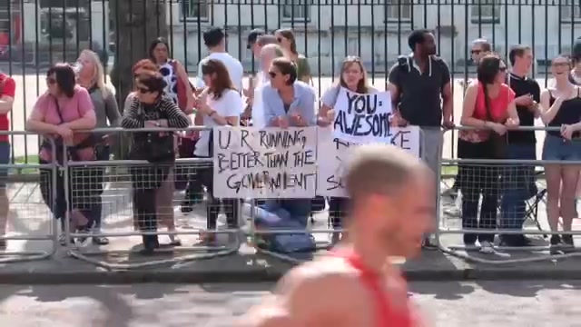 Runners and spectators near the final stretch of the London Marathon.