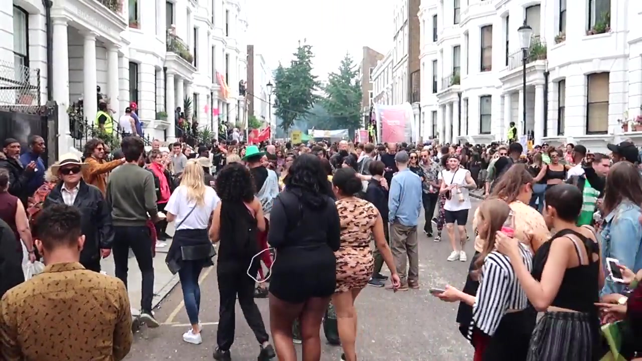 Crowds walking through Notting Hill Carnival in 2018