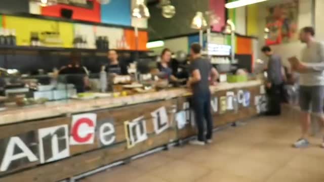 The colourful counter and seating inside Beany Green Paddington
