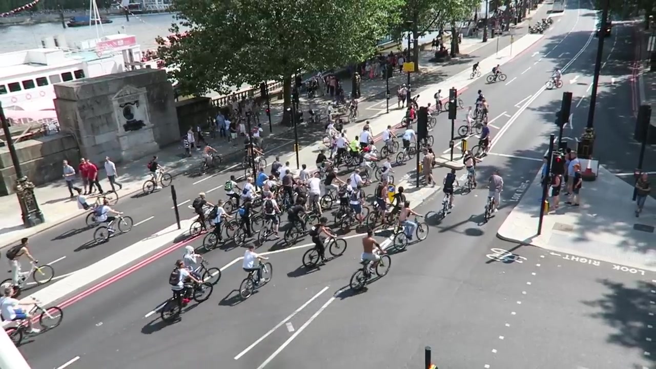 BikeStormz riders cycling past a crossing on Victoria Embankment in July 2016