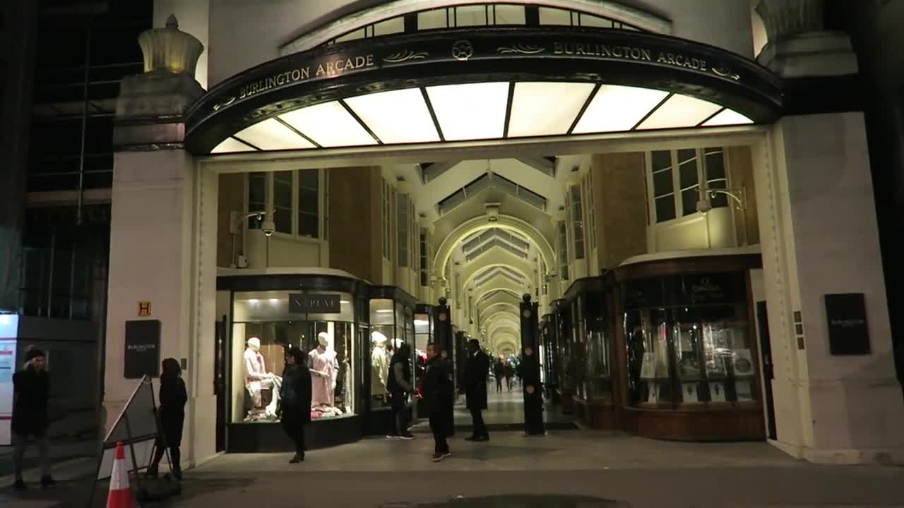 Lit Burlington Arcade entrance and shopfronts seen at night in 2016